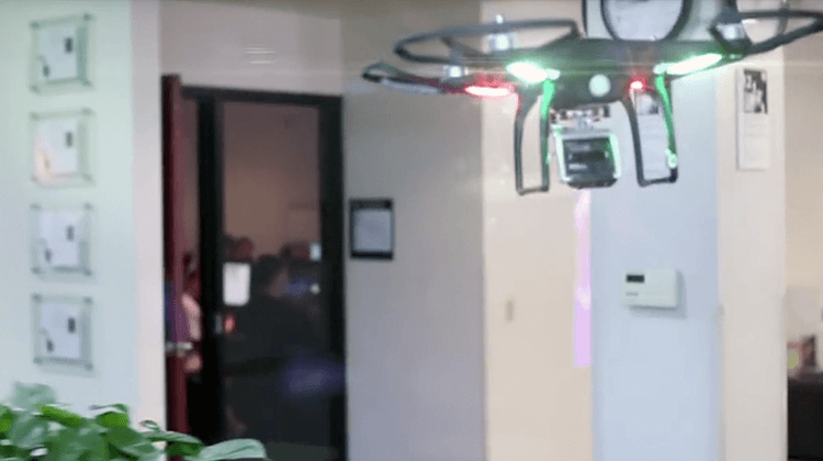 drone flying through university hall for video tour