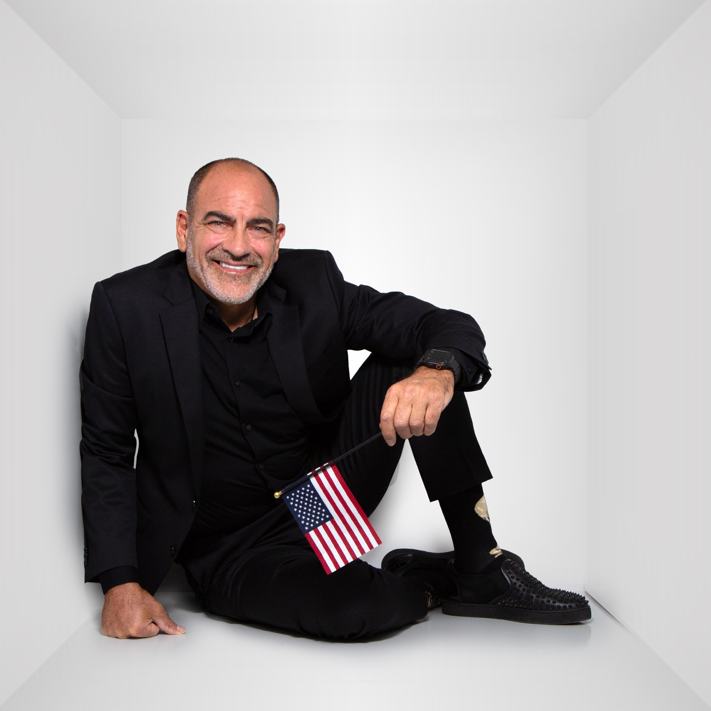 Brian holding an American Flag