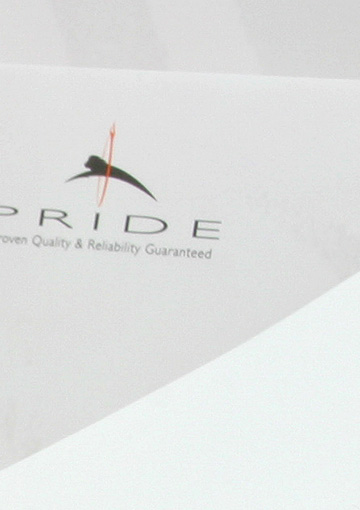 FabCom's envelope design for commercial printer featuring an illustrated lion jumping through a flaming hoop.