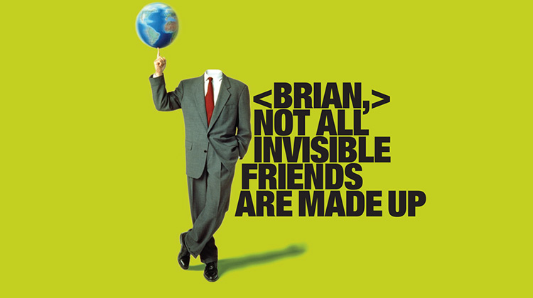 Graphics company campaign image of a headless business man spinning the world in his hand.