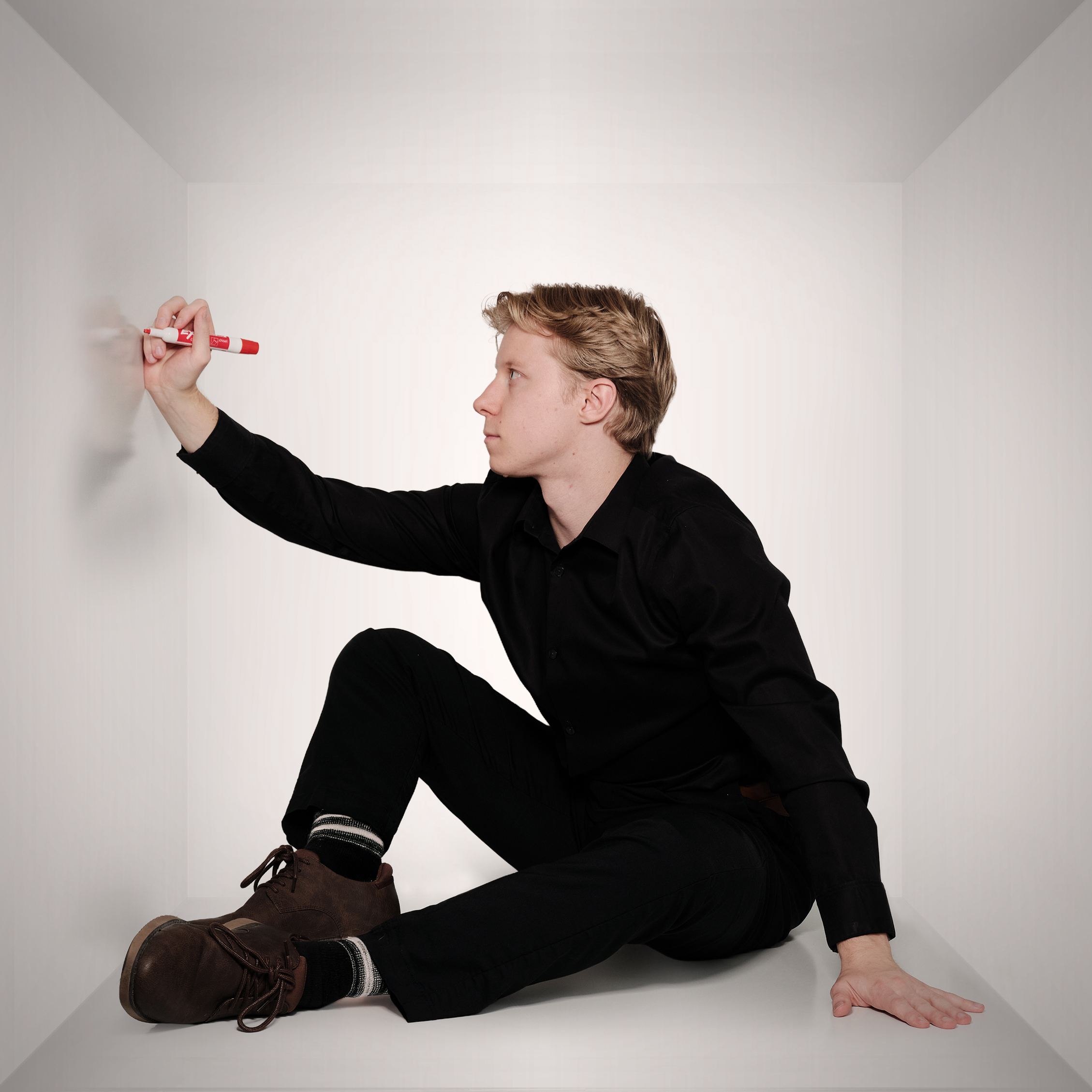 Chris drawing on the wall