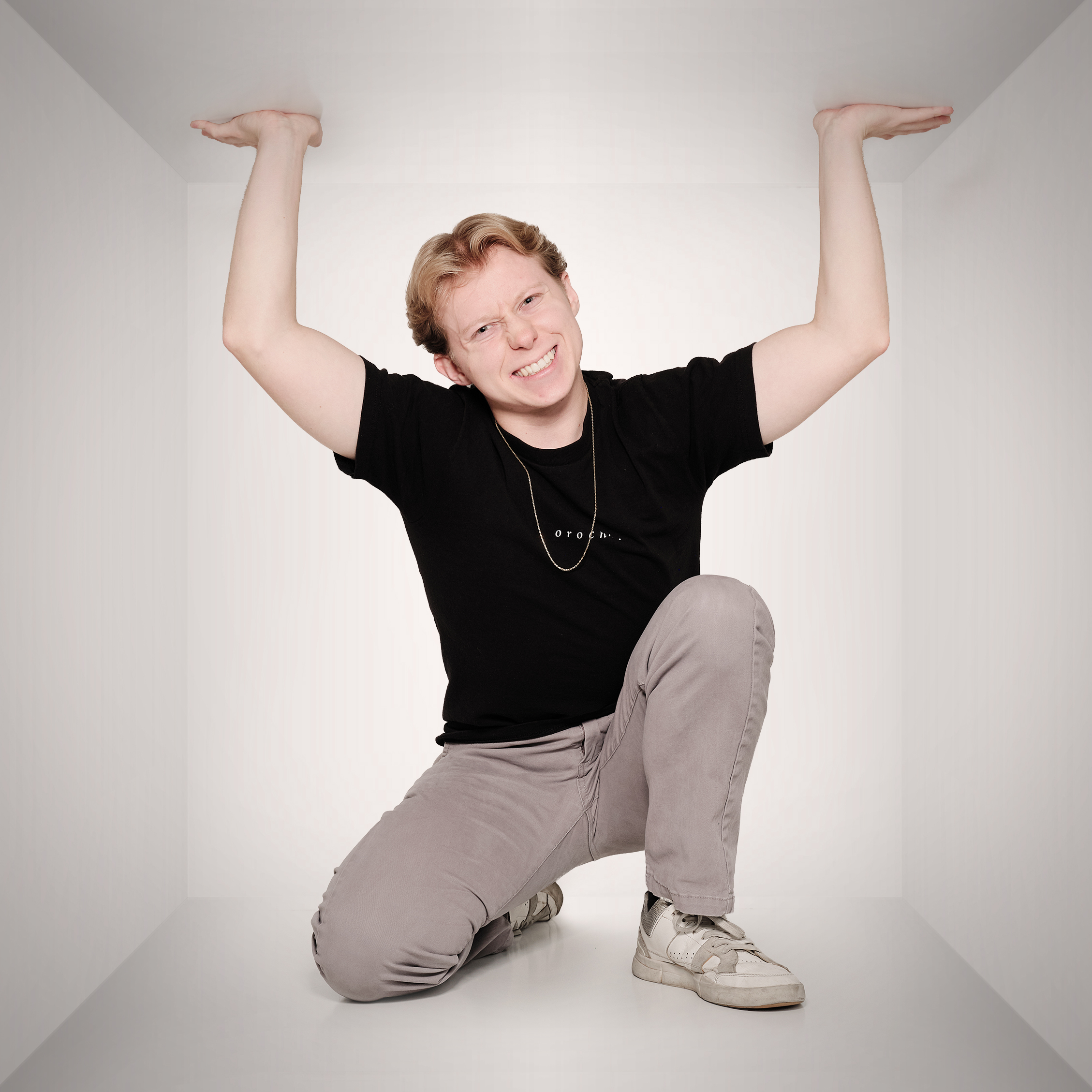 Chris holding up the cieling