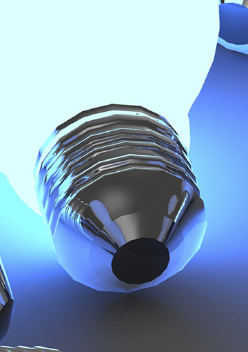 Close up of print ad created by FabCom Integrated Strategic Marketing for healthcare institute featuring light bulb tip showing intricate ad detail.