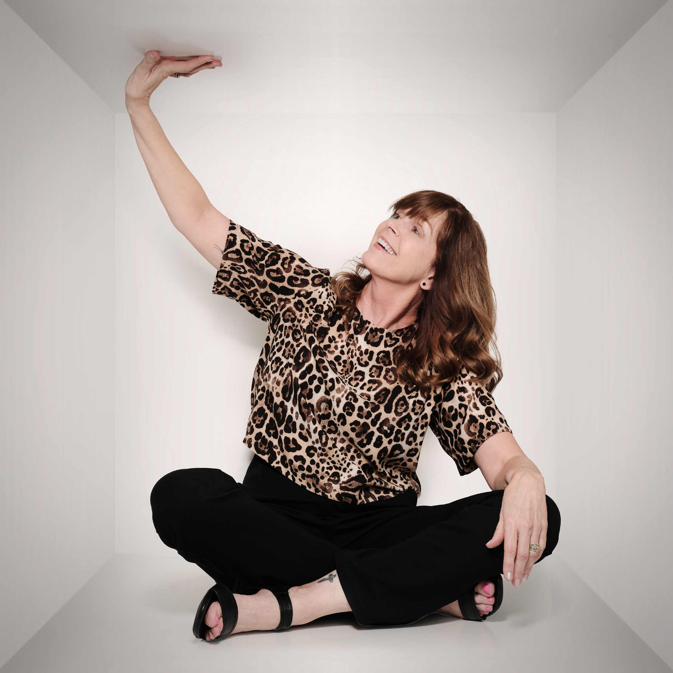 Jennifer touching the cieling