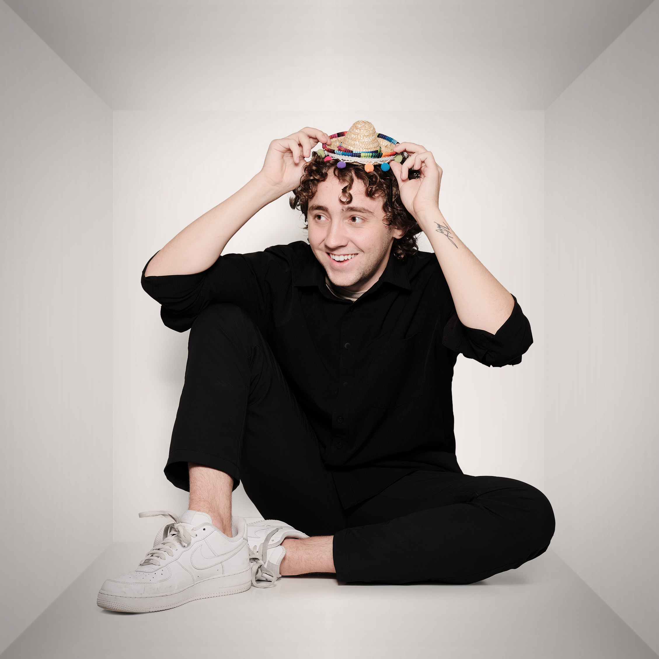 Michael trying on a tiny sombrero