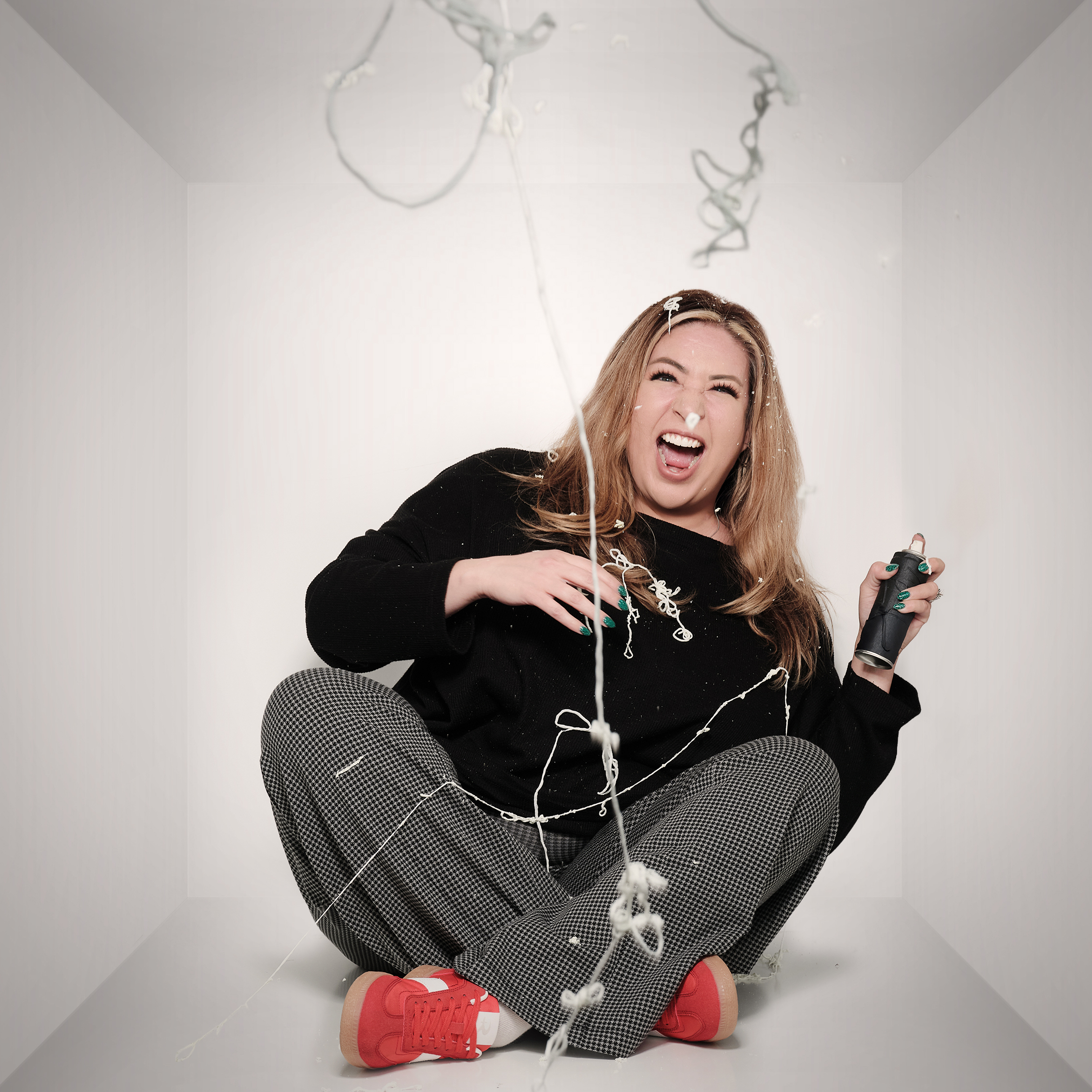 Monique playing with silly string