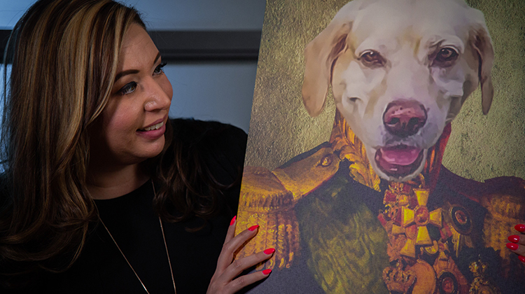 Monique holding dog painting