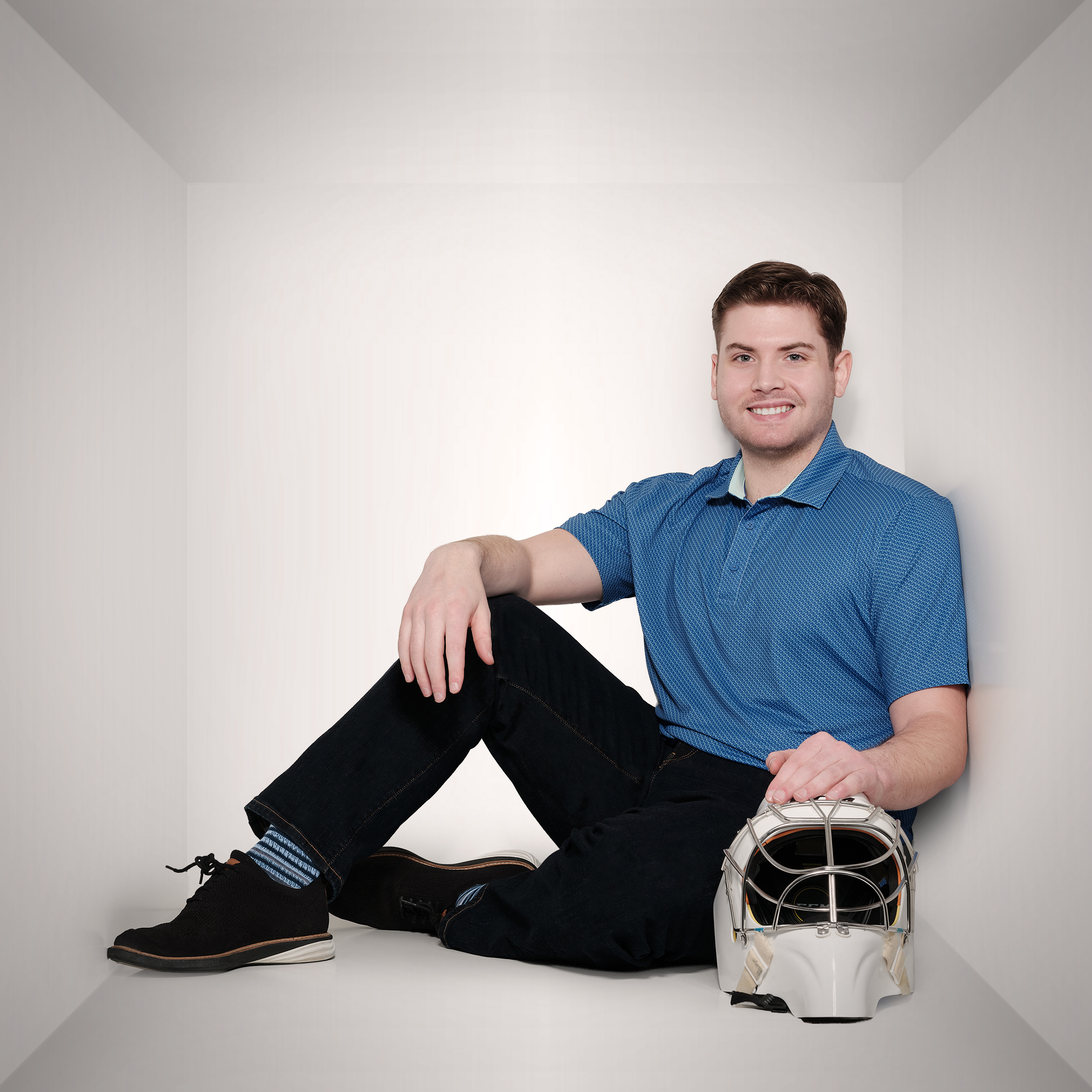 Nick with a goalie helmet