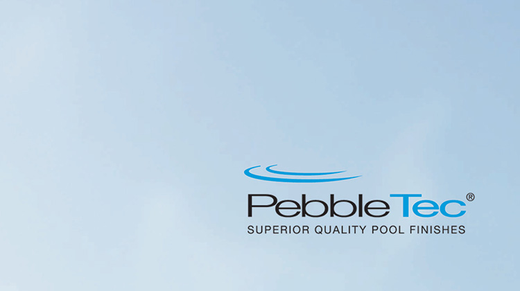 Zoomed in image of the company logo on title page of a corporate brochure developed by FabCom for a International Pool Finish Company