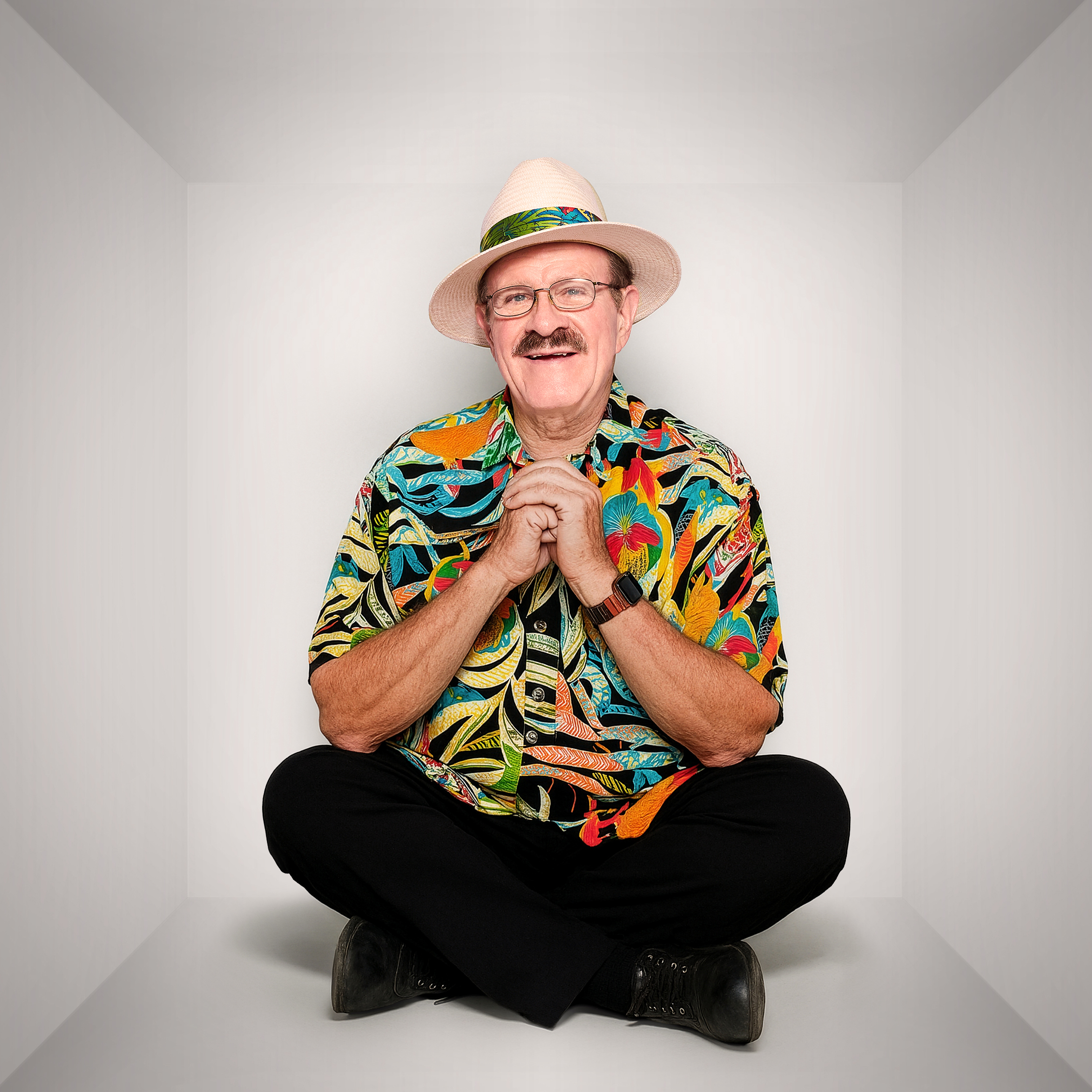 Paul smiling in his Hawaii shirt