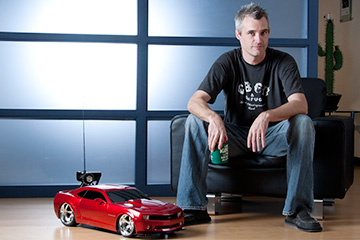 Creative Director Sean drives a classic 1969 Chevy Camaro represented by the remote-control model Camaro