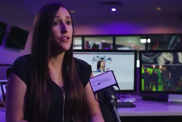 Close up interviewing woman in tech.