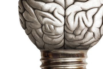 Graphic created by FabCom for a university lead conversion campaign that has a brain shaped as a light bulb with a metal light bulb cap on the bottom.