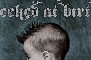 High-resolution zoomed in image of a baby with a mohawk for a geeked at birth campaign.