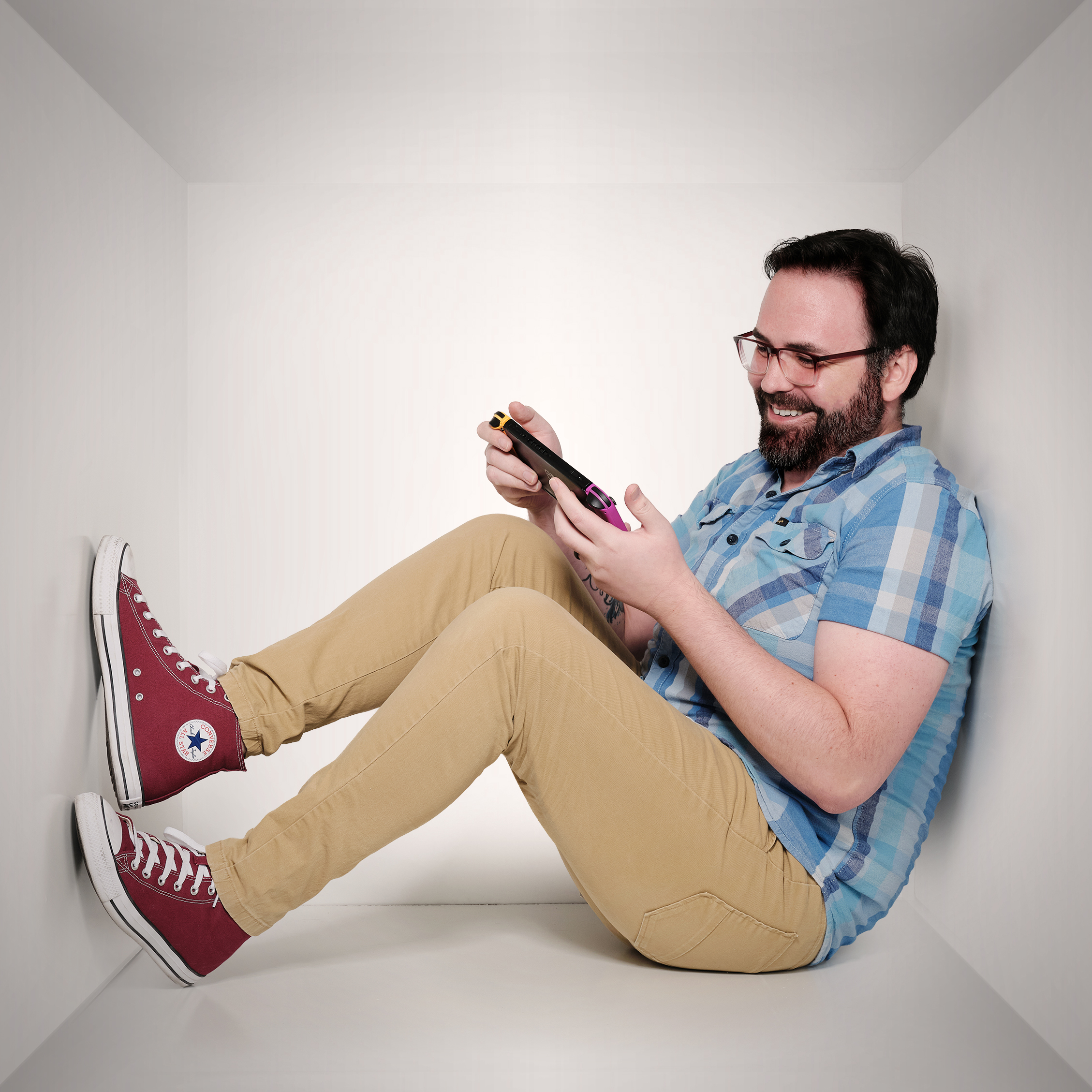 Trevor playing his Nintendo Switch