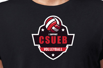 Zoomed in image of a black t-shirt featuring the logo FabCom designed for a university volleyball team.