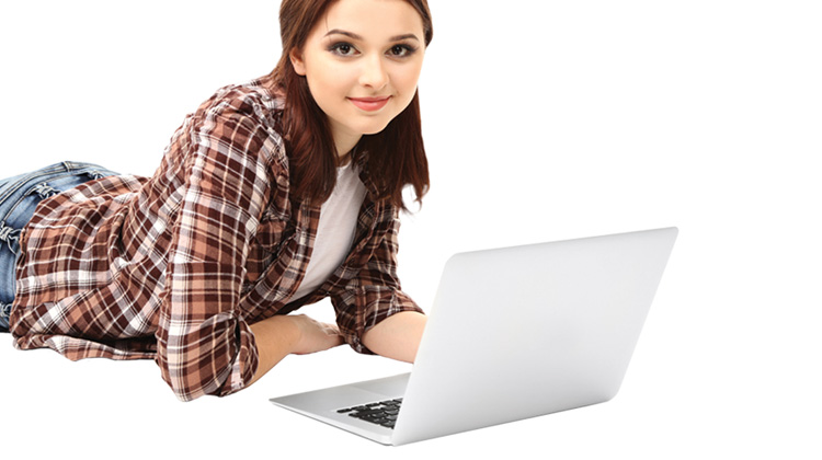 Zoomed in image of an HTML that FabCom created for a technology university's brand loyalty campaign. Image features a young adult woman working on a laptop.