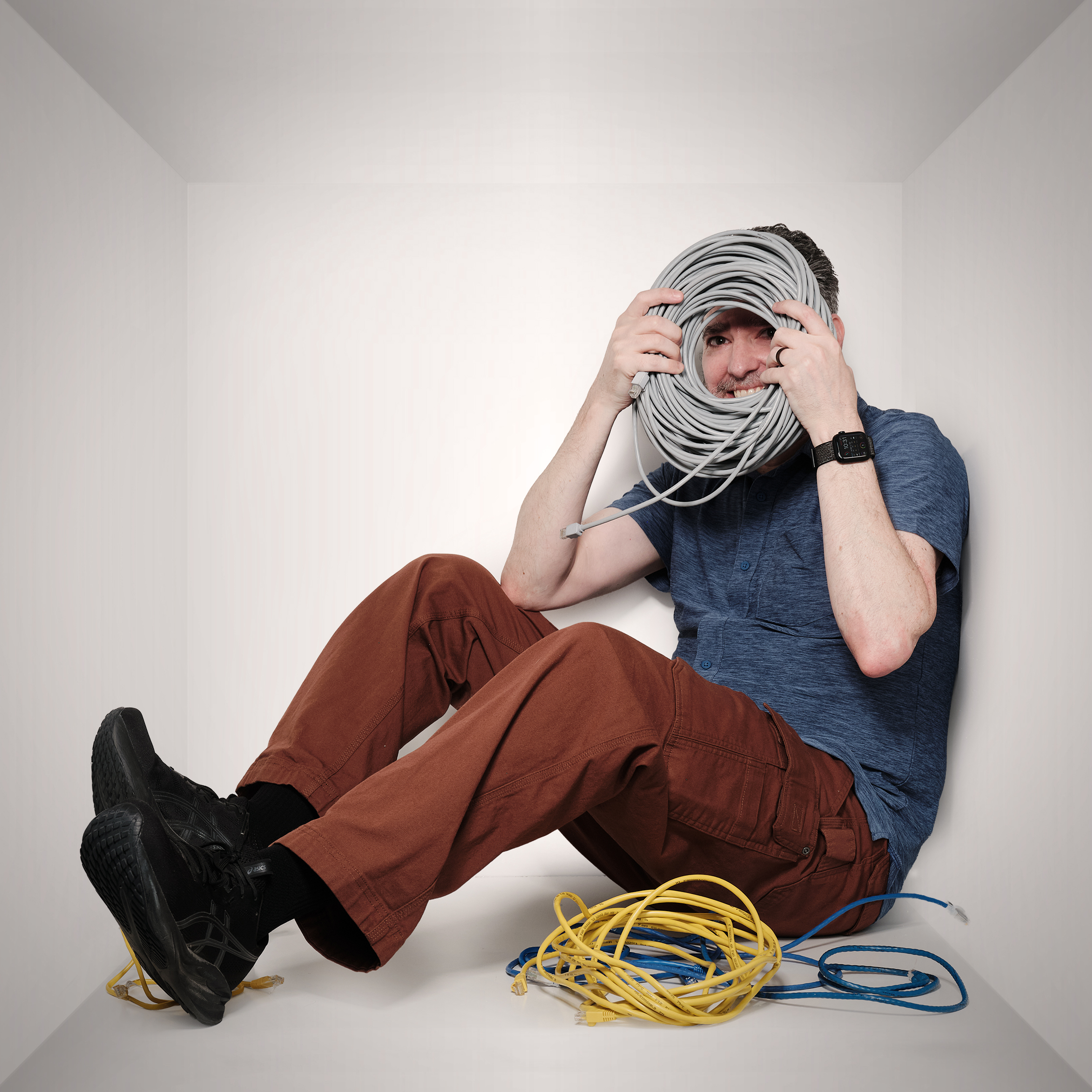 Yoni hiding behind a coiled network cable