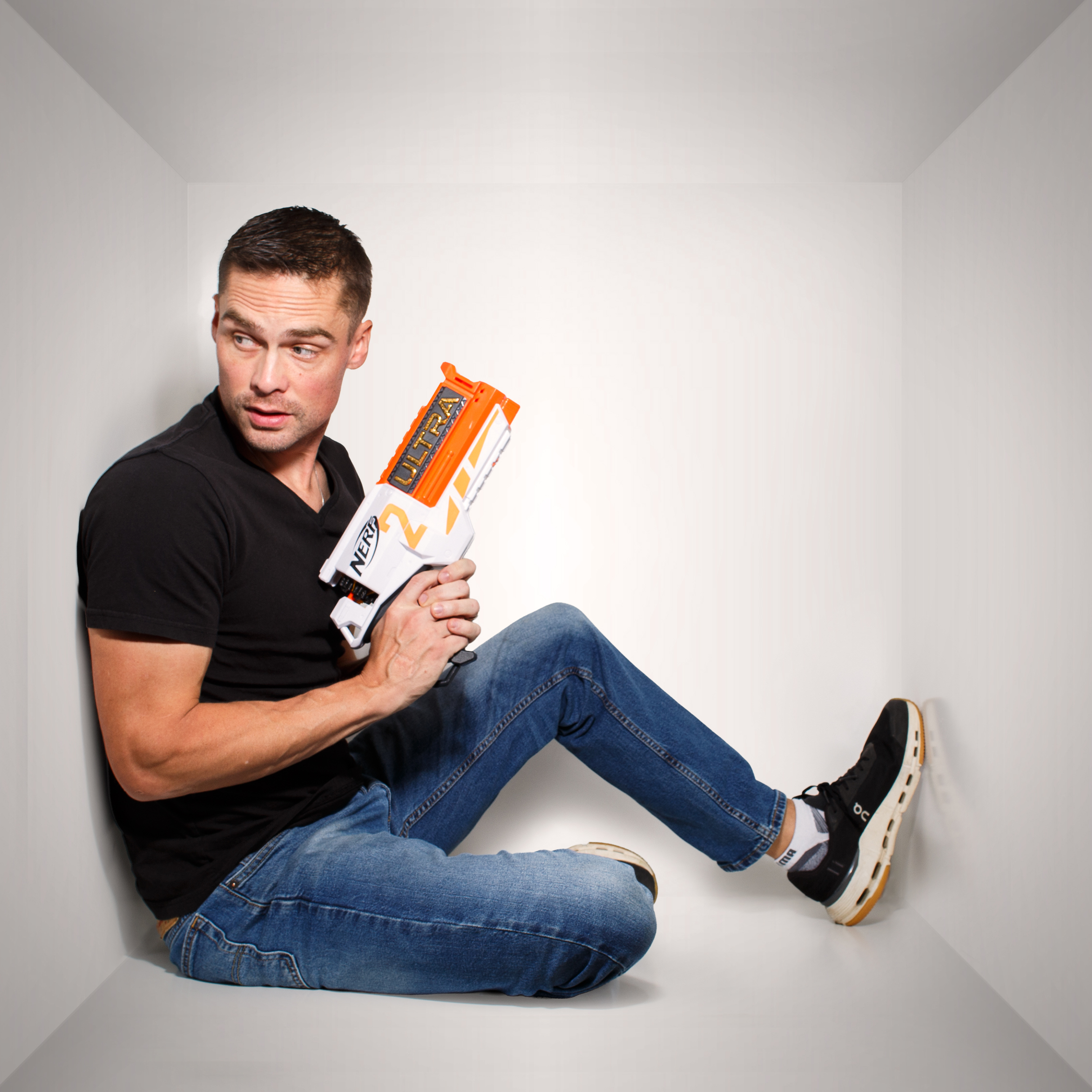 Zach holding nerf toy